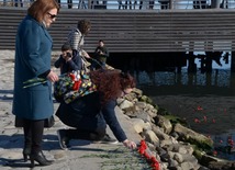 Baku residents bringing flowers to Seaside Boulevard to honor missing oil workers.  Azerbaijan, Dec.07, 2015